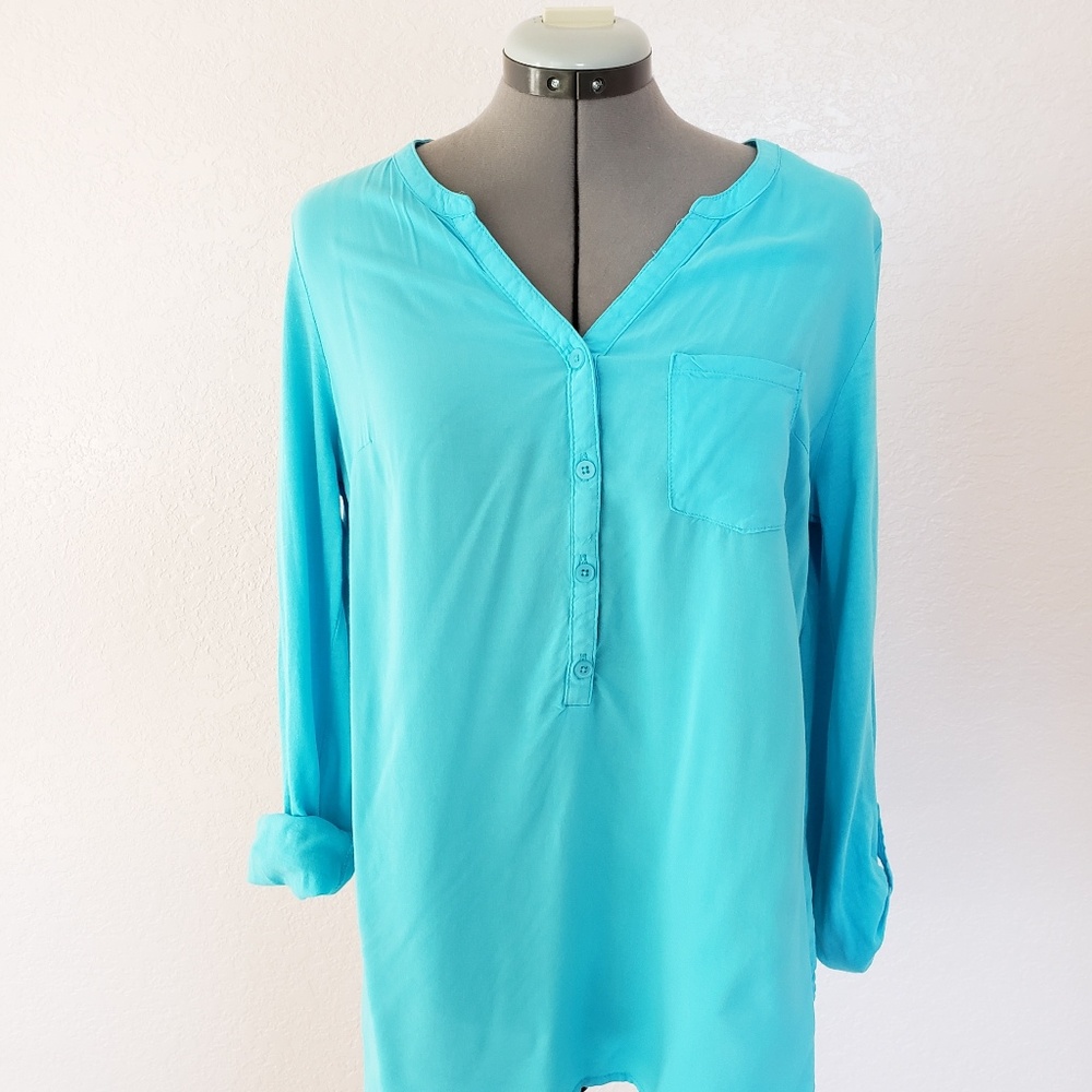Bright blue long sleeve shirt